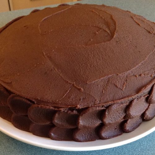 chocolate cake with caramel ganache and praline filling